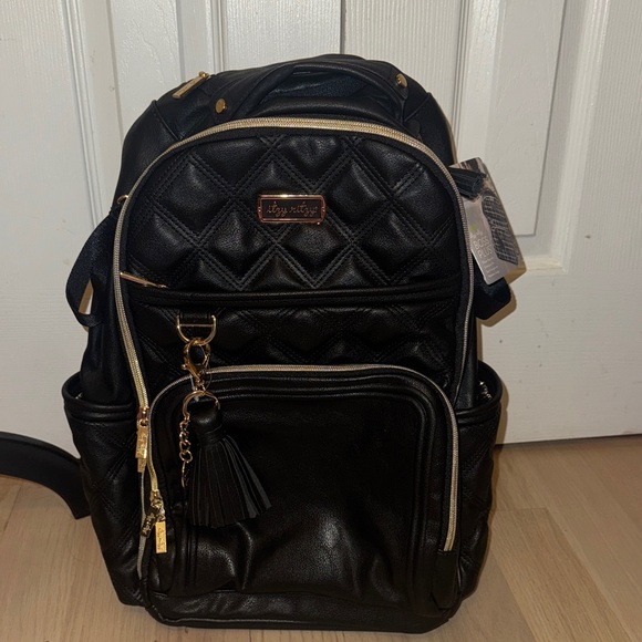 Itzy Ritzy Handbags - Itzy Ritzy Black Quilted Backpack with Gold Details